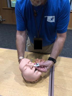 MRC Trainer demonstrating how to check airway