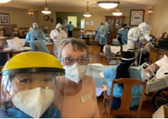 Group photo of medical staff and patients