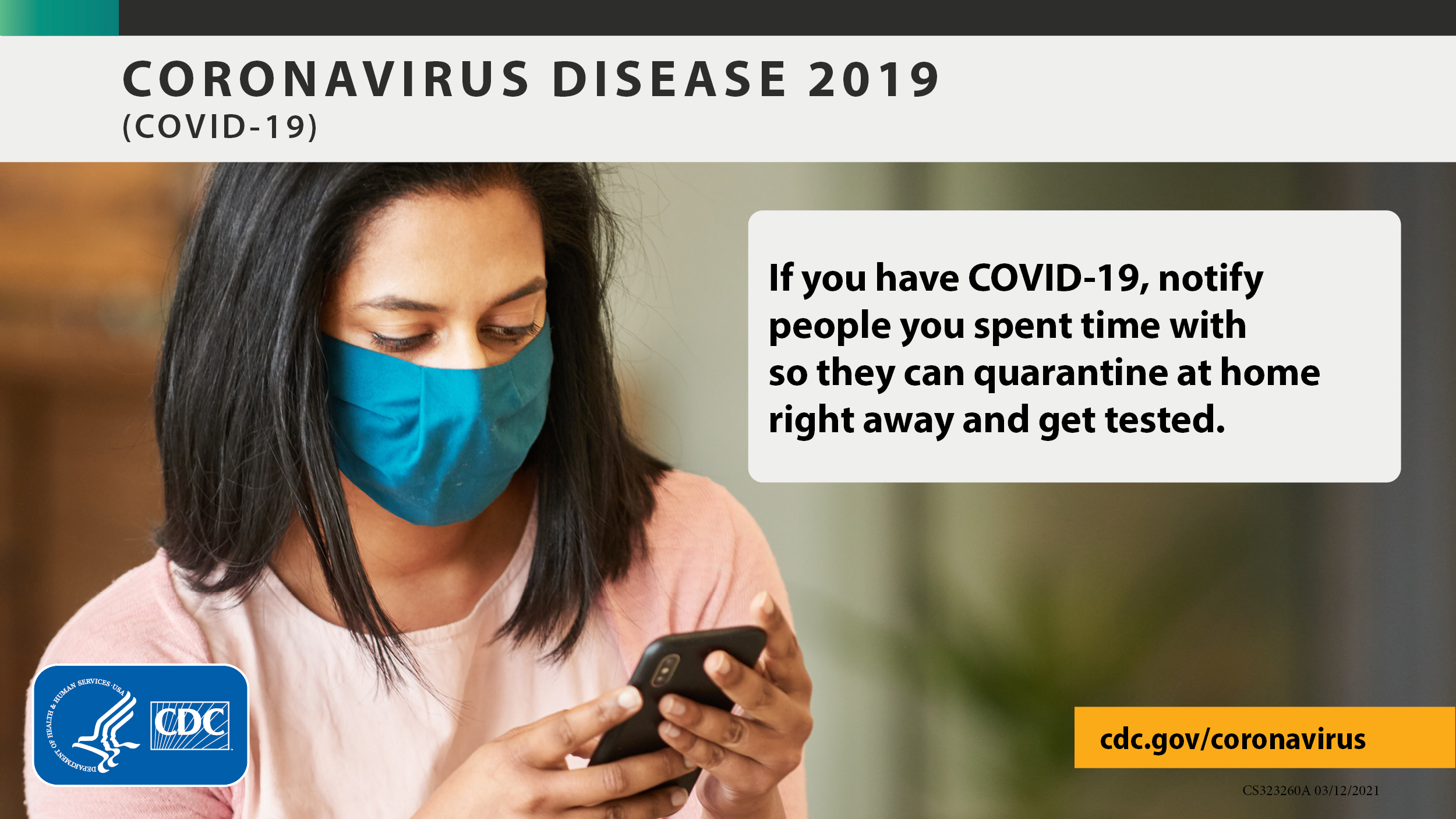 Image of person answering a call with another room in the background. cdc.gov/coronavirus.