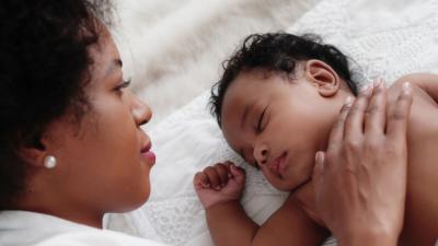 Picture of a mother with a sleeping baby