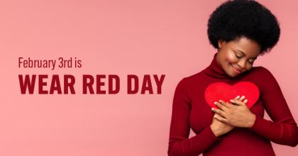 African American woman clutching heart for wear red day