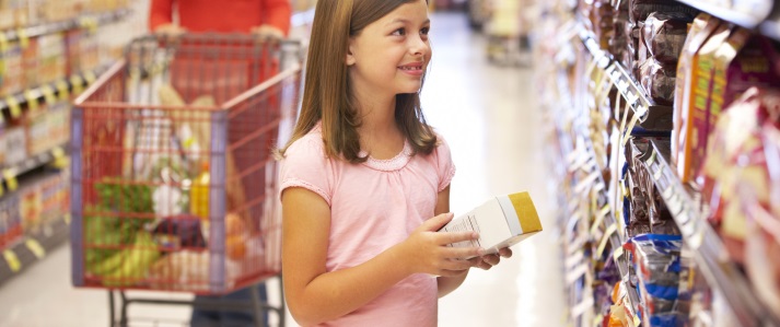 Girl Reading the Food Label