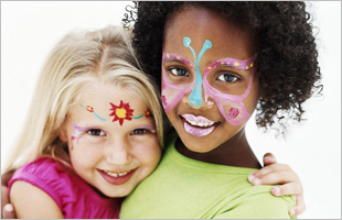 Two girls with face paint.