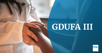 Female doctor holding hands of her patient at hospital room.