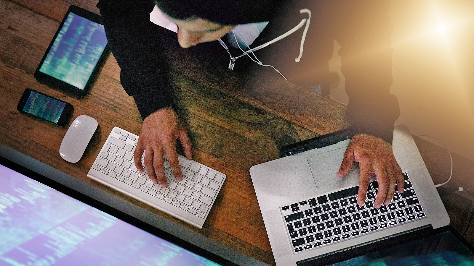 Man working on a laptop.