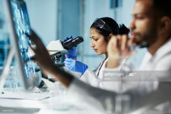 Researchers utilizing scientific instruments