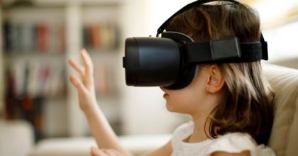 Child wearing virtual reality headset