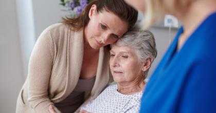 Mother and daugther embracing at the hospital