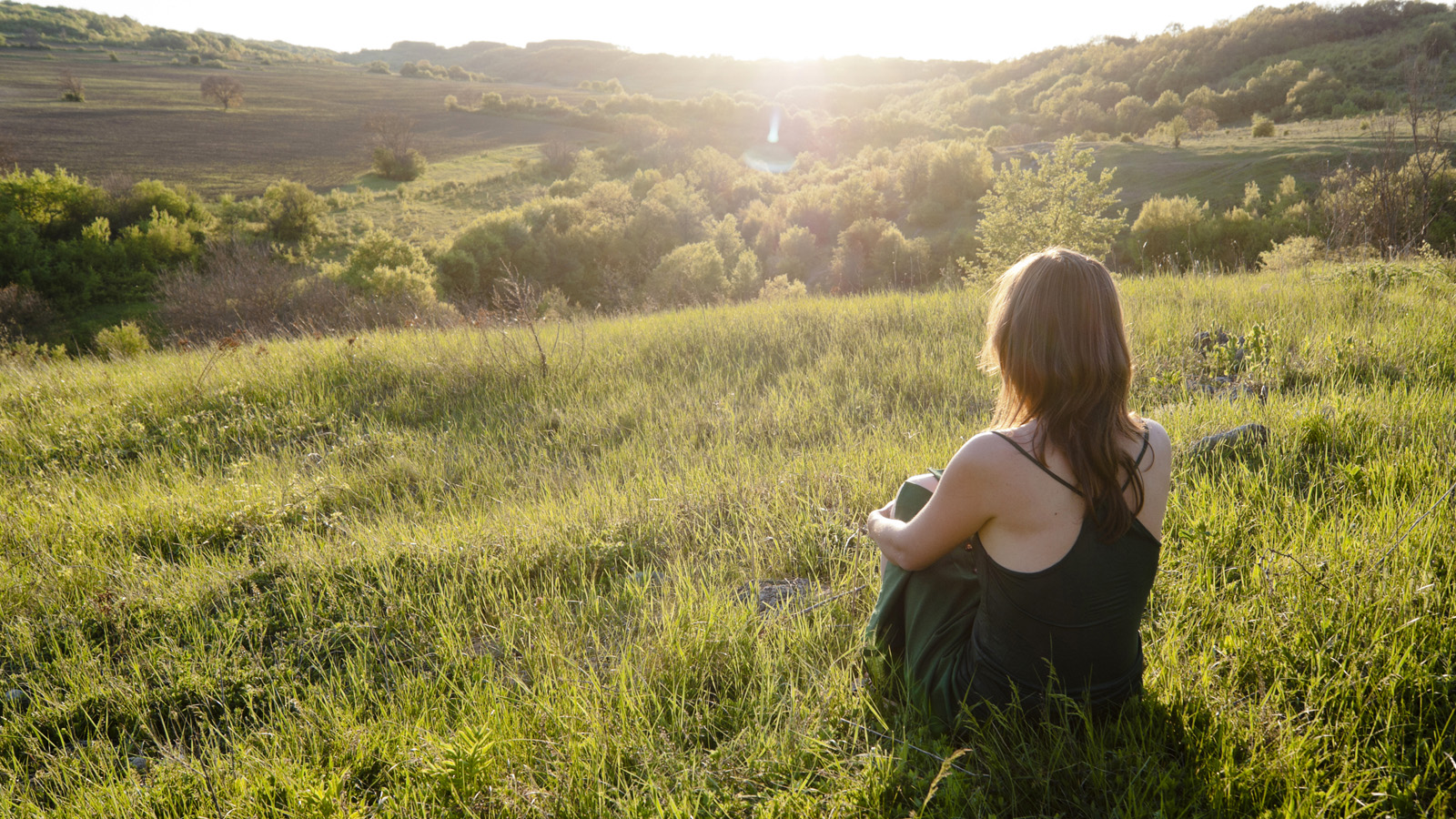 Woman sitting in a field