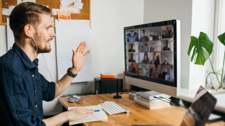 Man in a Zoom meeting 