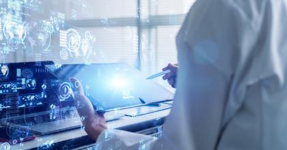 Scientist working on a computer