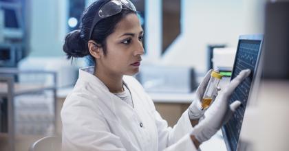 Female Scientist Working in The Lab, Using Computer Screen