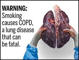 A rectangular cigarette health warning with a white background and black text that reads: "WARNING: Smoking causes COPD, a lung disease that can be fatal." To the right of the text is a photorealistic illustration showing gloved hands holding a pair of diseased, darkened lungs removed from a smoker with COPD. The warning is surrounded by a black outline. 