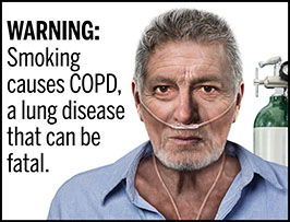 A rectangular cigarette health warning with a white background and black text that reads: "WARNING: Smoking causes COPD, a lung disease that can be fatal." Next to the text is a photorealistic illustration showing a man receiving oxygen support because he has COPD caused by cigarette smoking. The illustration shows the head and neck of a man (aged 50-60 years) who has a nasal canula under his nose supplying oxygen; the oxygen tank is behind his left shoulder. The warning is surrounded by a black outline.