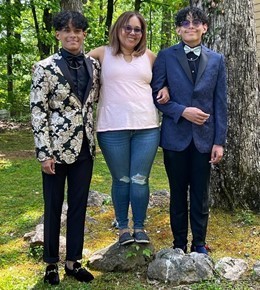 Photo of FDA Microbiologist Nancy Miranda (with her sons)