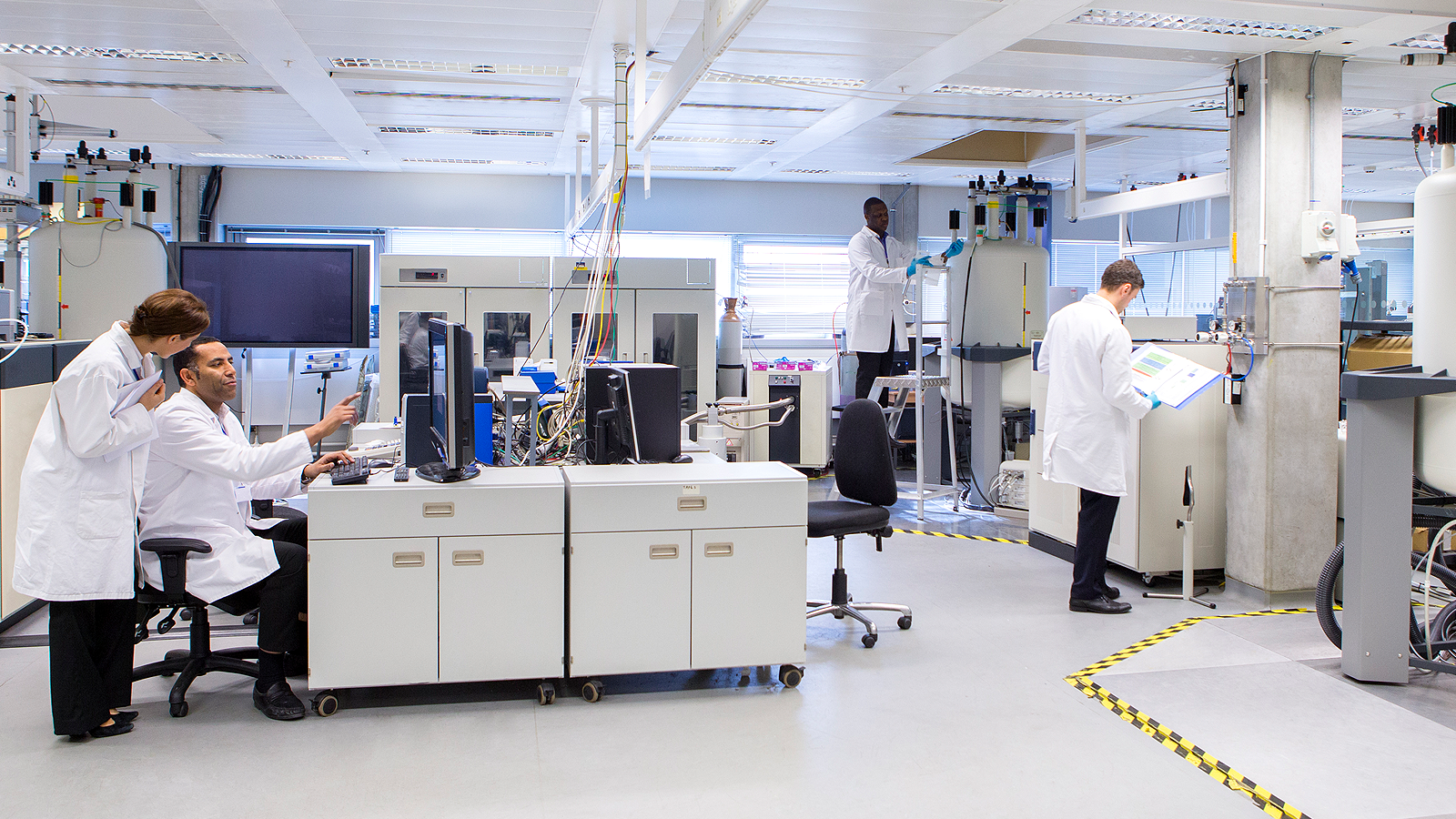 Medical science professionals working in a laboratory.