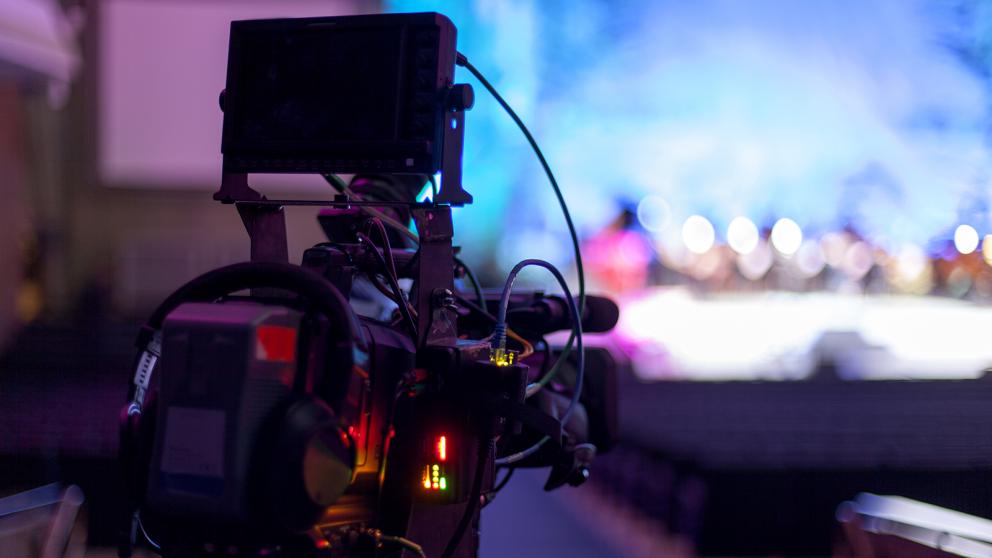 Professional digital video camera set up at an event
