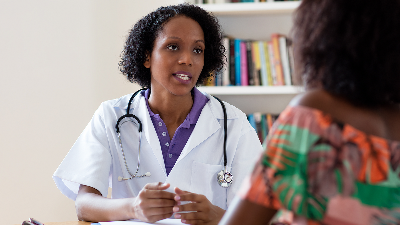 Doctor talking to patient