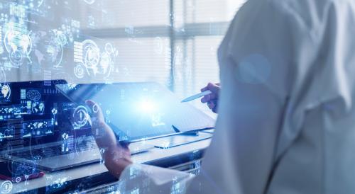 Scientist working on a computer