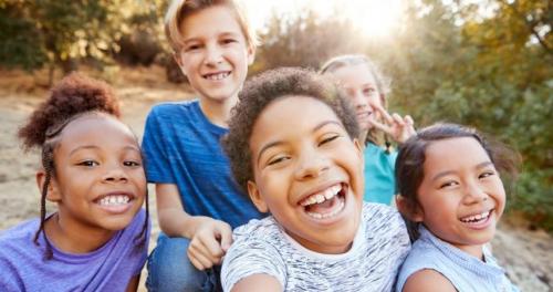 Main image of laughing children taking a selfie