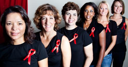 women wearing black shirts w red ribbons