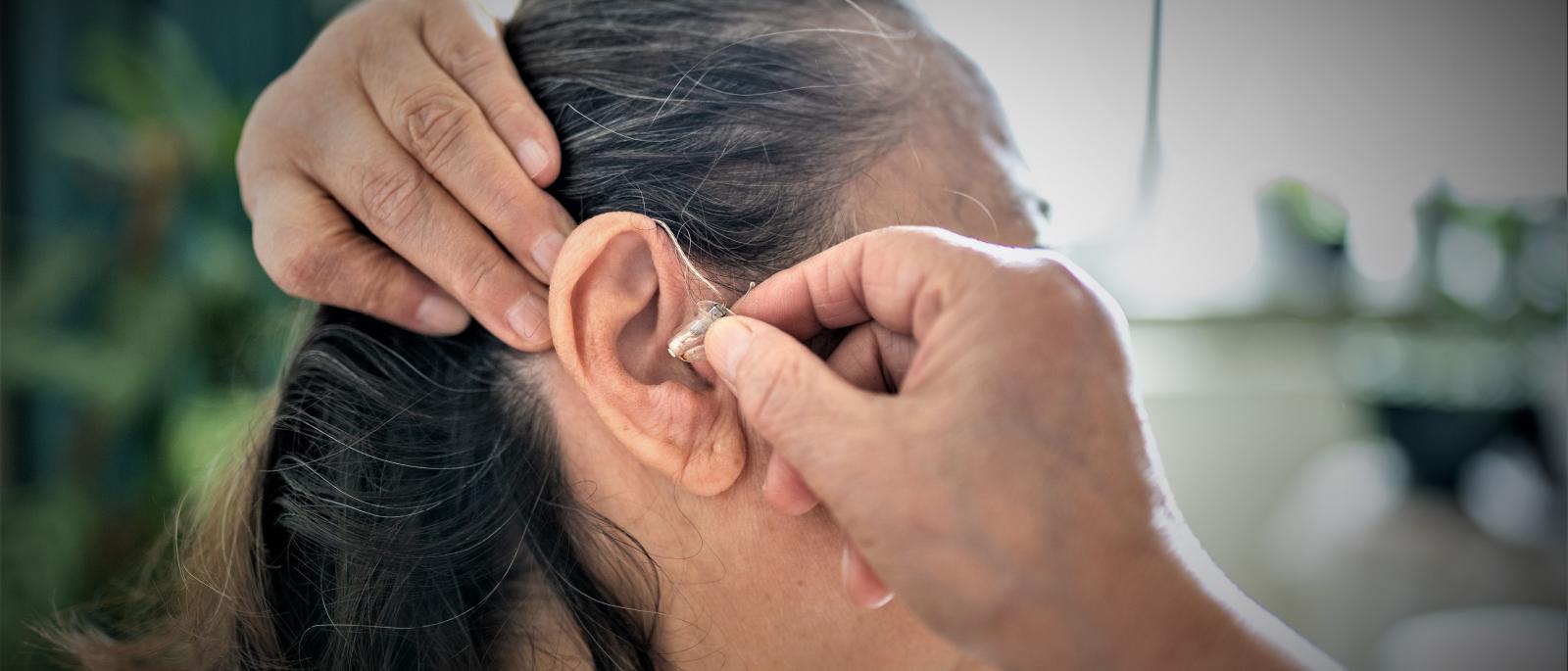 Woman with a hearing aid