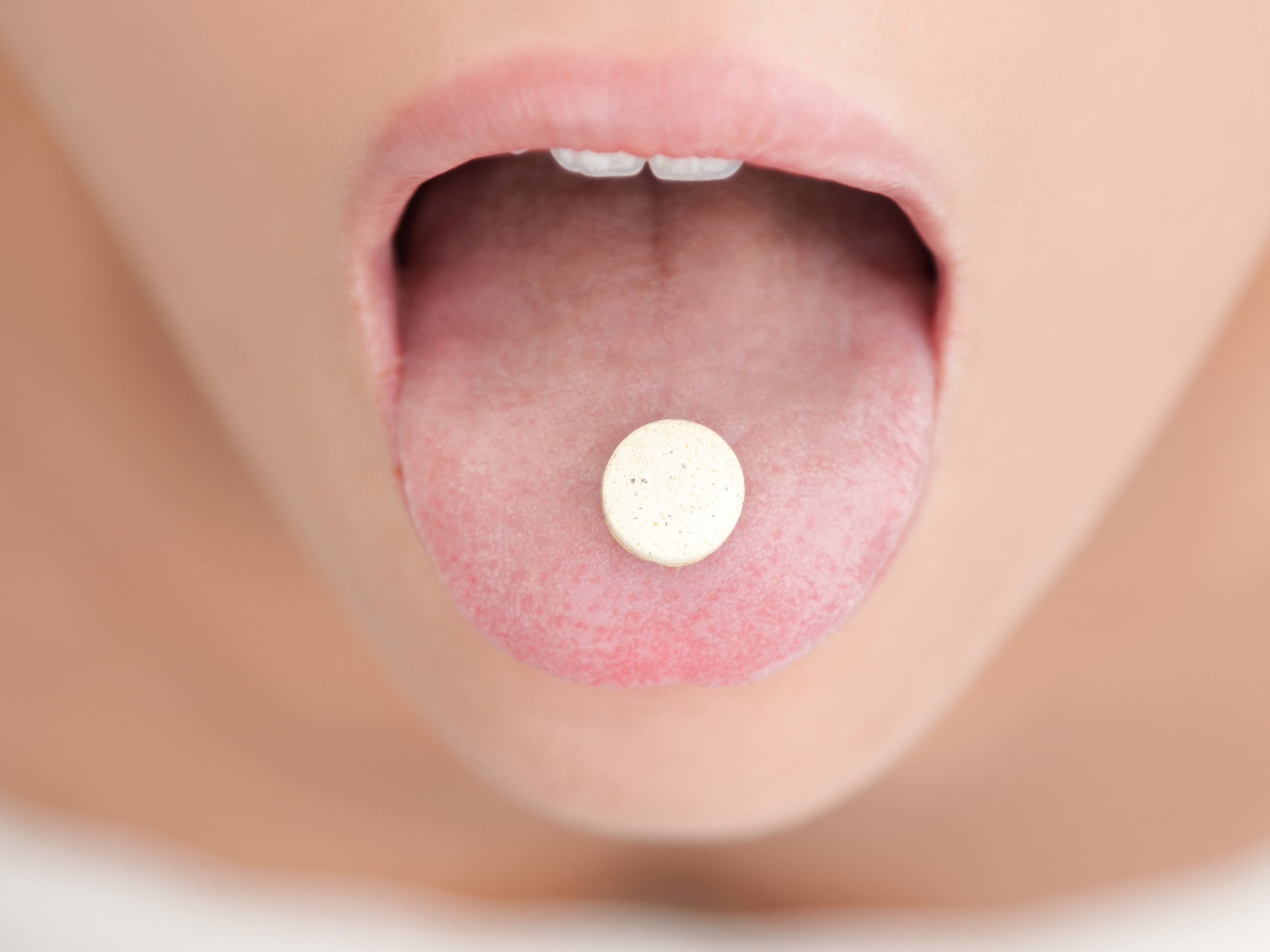 Pill on tongue