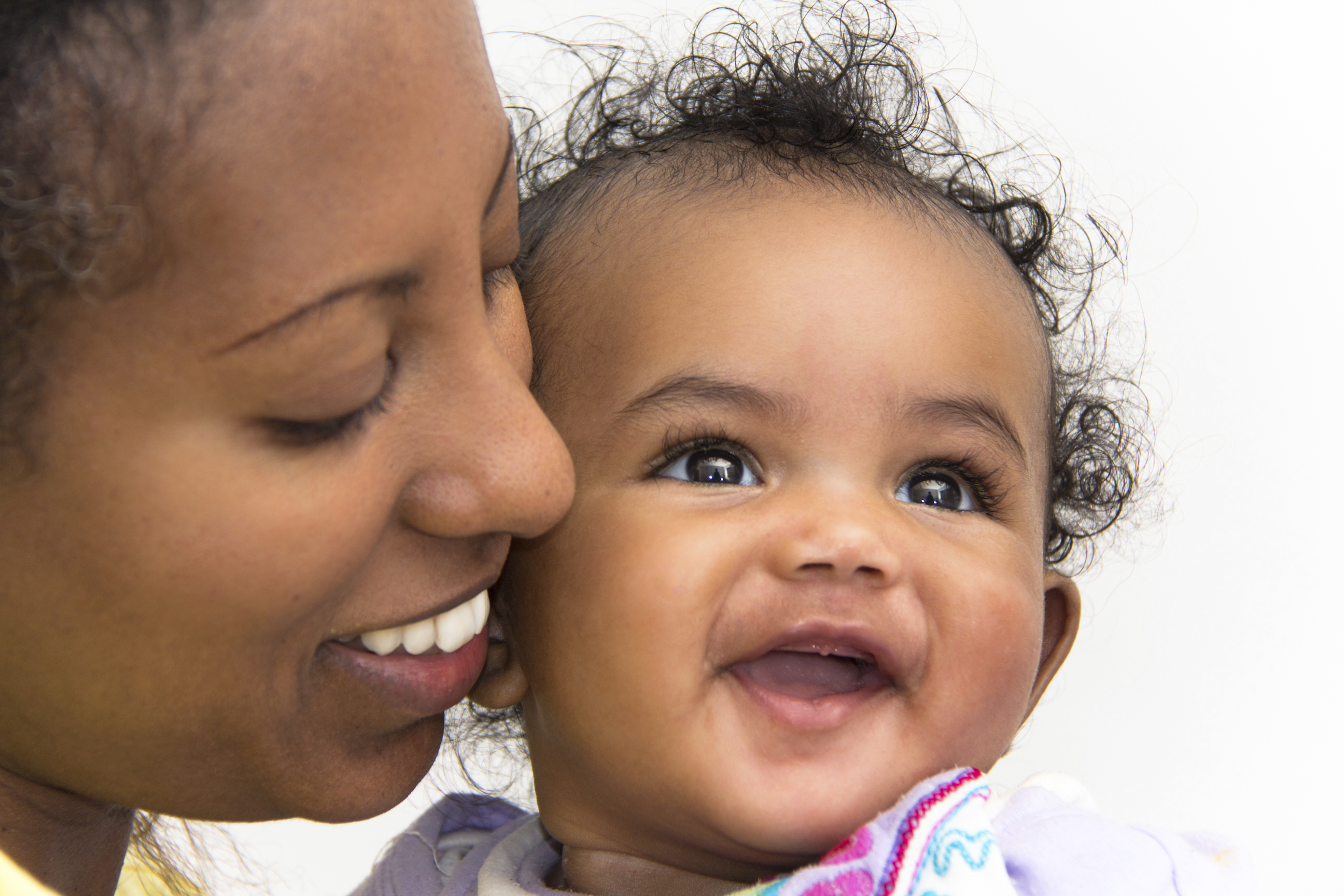 African American woman holding a baby