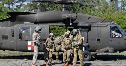 Combat medics conduct an exercise at the Marine Corps Training Area Bellows, Hawaii, on Jan. 10, 2018. (U.S. Army photo by Staff Sgt. Armando R. Limon, 3rd Brigade Combat Team, 25th Infantry Division)