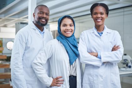 Portrait of a group of scientists working in a lab