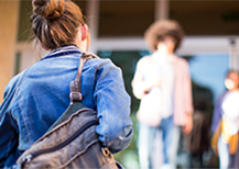 youth with backpack