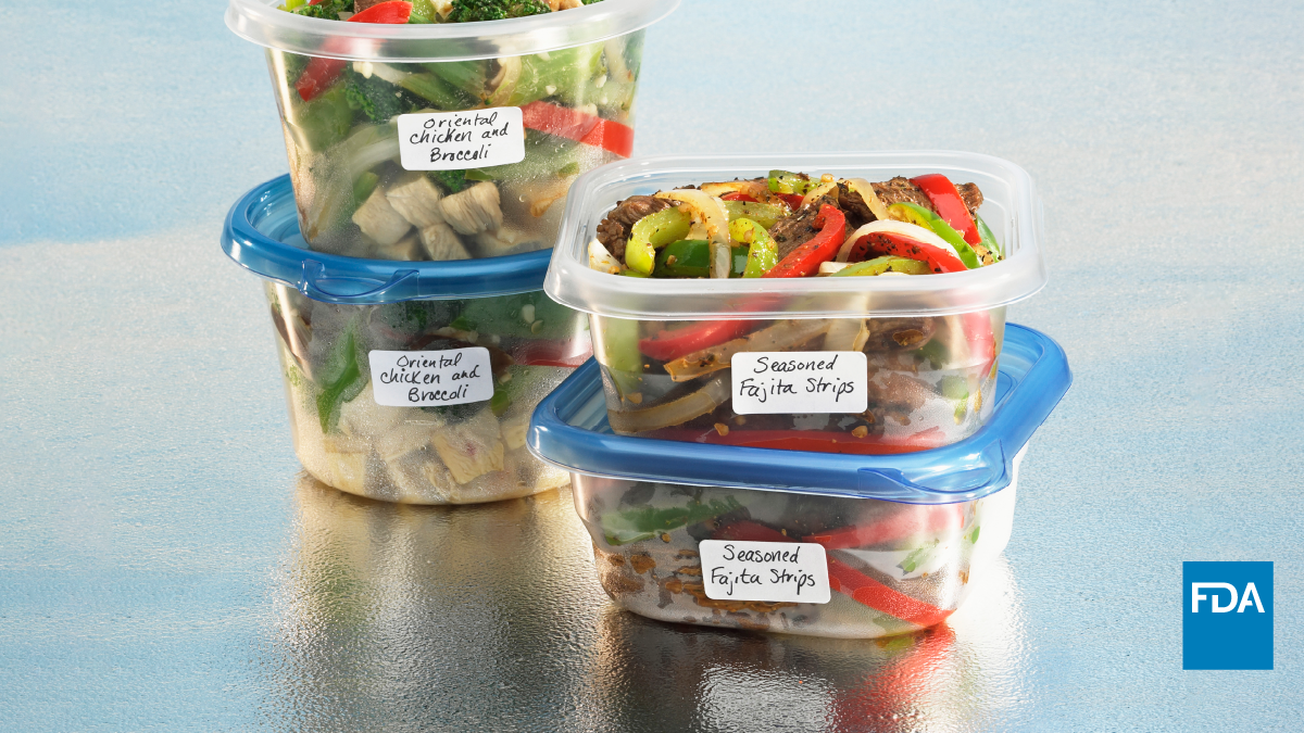 Leftover food in plastic storage containers with labels