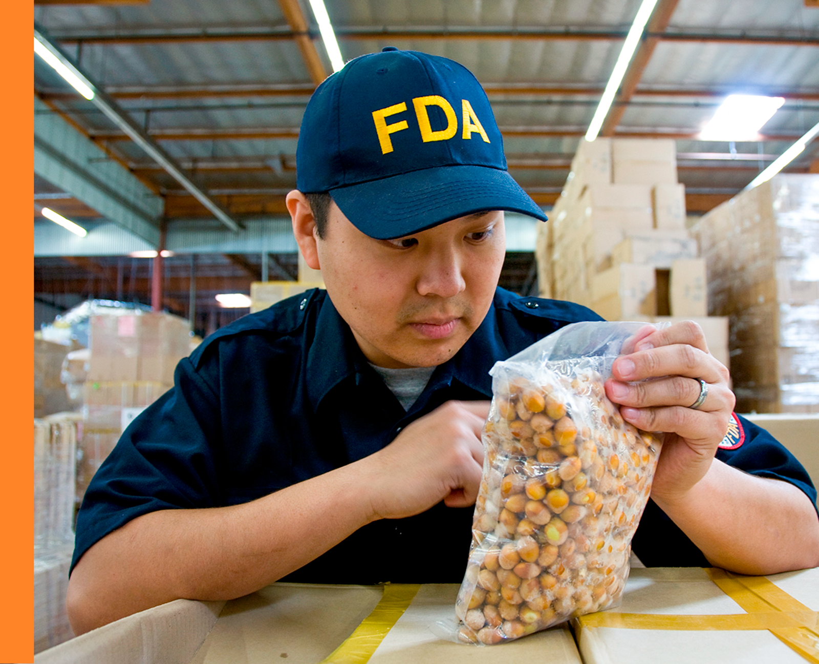 FDA inspector inspects bag of food in warehouse