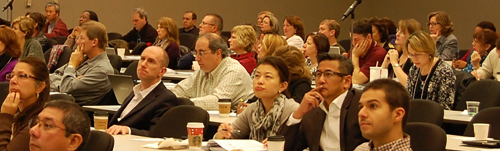 Audience Participating in Scientific Professional Development Lecture