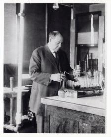 Harvey Wiley in laboratory with analytical equipment, black and white