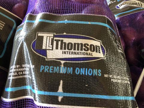“Product label, TLC Thomson International 25 LBS mesh sack”