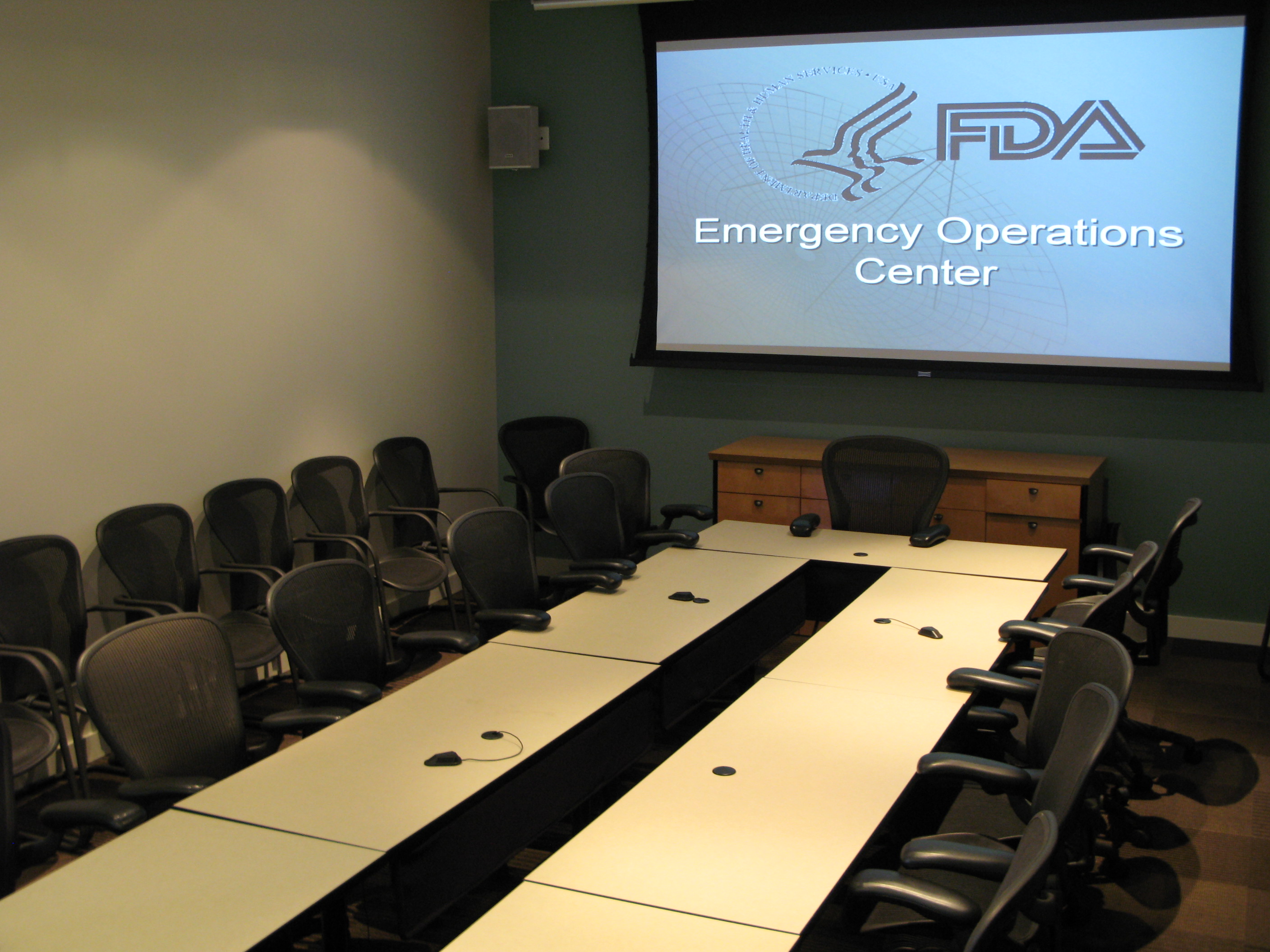 Large conference room with screen in the Emergency Operations Center