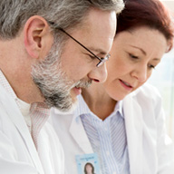 Man and woman in lab coats