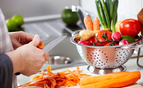 Woman cutting vegetables