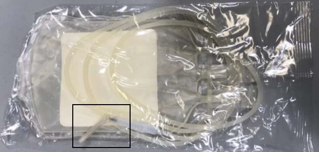 Recalled Combat Medical blood bag with a bent needle.