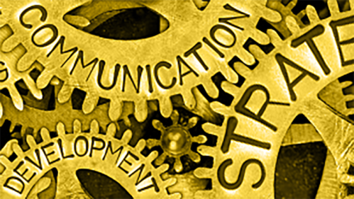 OGPS golden gears etched with communication, development, and strategy