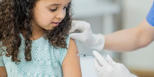 Vaccinating girl
