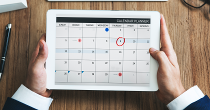 Calendar on a tablet showing meetings and events