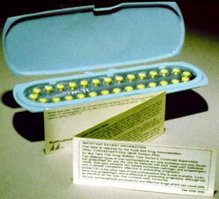A case containing birth control pills, with the printed patient insert