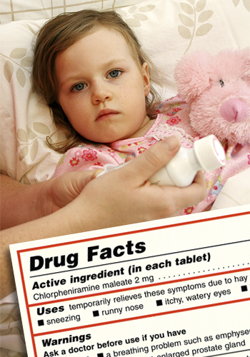 IDrug Facts label, child in bed receiving medicine