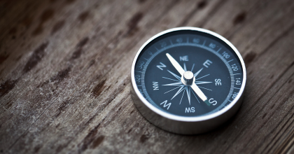 Compass on wood table