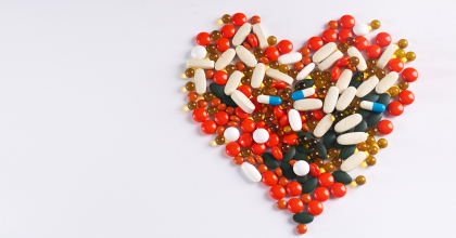 Different pills laid out in the form of heart