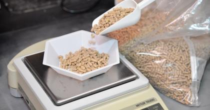 animal feed being weighed on a scale