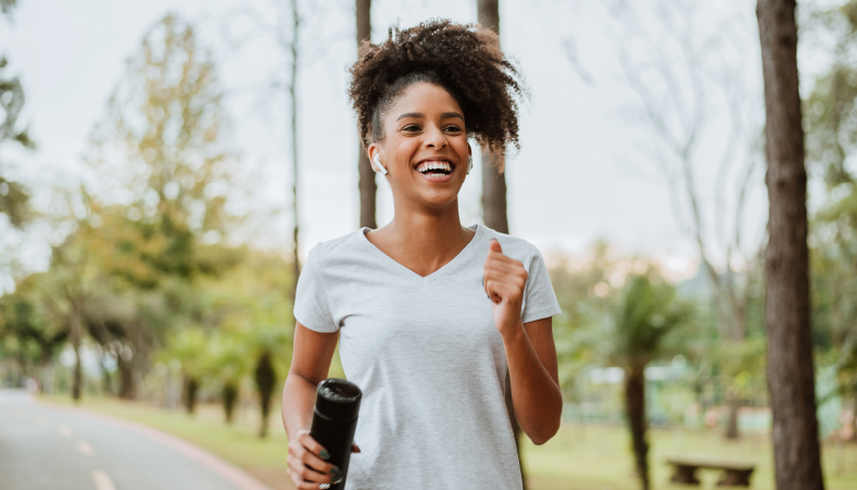 Young African American woman jogging