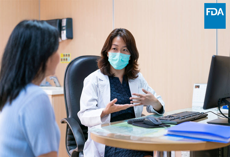 Photo of a physican and patient having a discussion
